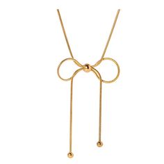 Indulge in a touch of elegance with our Gold Bow Minimalist Necklace. Crafted from delicate gold rope  with a feminine bow design, this necklace adds a subtle yet sophisticated touch to any outfit. Embrace minimalism and elevate your style with this must-have accessory. 18K Gold plated stainless steel Tarnish resistant Hypoallergenic Lightweight Although our jewelry is meant for every occasion, if you want the color to last longer, we do not recommend sleeping, showering, swimming or exercising while wearing your jewelry. Also please do not spray perfumes, hairsprays, or lotions directly near your jewelry as many beauty products cause tarnishing of metals. Elegant Gold Necklace With Decorative Bow, Gold Bow Necklace For Party, Gold Necklace With Bow For Party, Elegant Gold Necklace With Bow Detail, Elegant Gold Necklace With Bow, Adjustable Necklace With Decorative Bow, Chic Gold Lariat Necklace, Gold Necklace With Decorative Bow For Party, Elegant Gold Jewelry With Butterfly Knot