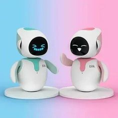 two small white and black toy animals on pink and blue background