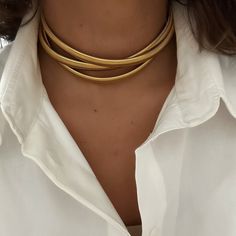 This bold and beautiful triple coil strand necklace is perfect for any occasion - with its water and tarnish resistance, it will remain iconic for years to come! So make your mark and stand out! BE AN ICON! 12-inch plus 3" inch extenderGold plated over stainless steelFlexible and bendy coil designWater/tarnish-resistant. Coil Design, Jewelry Cleaning Solution, Extraordinary Women, Gold Necklace Designs, Water Design, Bold And Beautiful, Make Your Mark, Small Jewelry, Gold Pearl