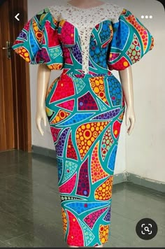 here is our Retro and unique Ankara print..Made for all event... This dress is made with 100% cotton African print. The dress is made to order so customisation is welcome.We can add or remove anything you wish.You are welcome to request a change of fabrics as well.We have lots of fabric options available. If you have any question please do feel free to start a chat. Thank you for visiting our store. Gown Ankara Styles Long, Lovely Ankara Gown Styles, Ankara Fitted Gown Styles Long, Fitted Batik Print Dress For Party, Fitted Batik Print Party Dress, Multicolor Batik Print Dress For Party, Traditional Party Dress With Digital Print, Multicolor Batik Print Party Dress, Artistic Fitted Party Dresses