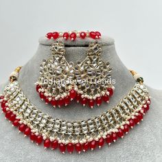 Red Kundan Necklace Set/ Kundan Choker/ Bollywood Jewelry/ Indian jewelry/ Pakistani necklace/ punjabi necklace/bridal/indian wedding Regular Size And Adjustable Kundan Necklace Indo-Western Necklace Set This is 100% Handmade jewelry. So Color, shades, texture displayed may slightly vary from the actual product due to digital image limitations. We request you to consider these minor variations. Please expect the possibility of some slight imperfections when buying hand made jewelry. If you have any questions, please message or email us. Arrives in gift box. Please let me know if you have any questions. Thank you so much visiting my shop. Punjabi Necklace, Pakistani Necklace, Western Necklace, Bridal Indian, Jewelry Pakistani, Western Necklaces, Kundan Necklace Set, Kundan Choker, Bollywood Jewelry