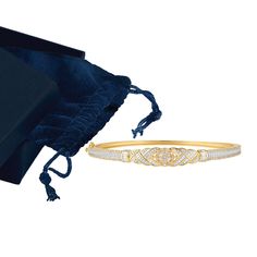 The endless luxury of fine diamond jewelry! This exquisite 14t gold-plated sterling silver bangle features over 1/3 carat of genuine diamonds! 60 diamonds – over a 1/3 carat – are meticulously set in the sculpted, dimensional setting. Elegantly presented in our signature gift box. Elegant Gold Diamond Bracelet Gift, Elegant Diamond Gold Bracelet As Gift, Elegant Gold Diamond Bracelet As Gift, Elegant Gold Diamond Bracelet For Gift, Dazzling Gold Diamond Bracelet For Anniversary, Elegant Gold Bracelet With Diamond Accents In Diamond White, Elegant Diamond White Gold Bracelet With Single Cut Diamonds, Elegant Diamond White Gold Bracelet With Diamond Accents, Elegant Diamond Bracelet Gift