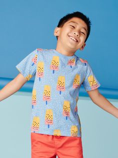 They'll feel super cool in our Tropical Popsicle tee that's basically summertime on a shirt. Crafted from 100% soft cotton jersey that holds its vibrant colors and style no matter how many washings. Above thigh length. Matching family styles are available in our Sibling Shop. Playful Multicolor Printed T-shirt, Cotton T-shirt With Cartoon Print For Playwear, Trendy Cotton Tops For Playwear, Playful Short Sleeve Graphic T-shirt, Playful Blue Top With Funny Print, Casual Cartoon Print T-shirt For Playwear, Casual Tops With Cartoon Print For Playwear, Summer Cartoon Print Top For Playwear, Playful Cotton Tops