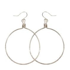 You won’t want to take these hoop earrings off - they are effortless, light and comfortable to wear all day and into the evening. These handmade earrings are perfect for everyday wear. This item is part of the “Hope Line” which consists of introductory pieces made by our new artisans, and tell a powerful story of fresh beginnings. The artisans learn the skill of wrapping wire while making these earrings! 2" drop Available in brass & silver plated brass Sustainably handcrafted by artisans escapin Everyday Hypoallergenic Hoop Wrap Earrings, Nickel Free Circular Earrings, Modern Nickel-free Hoop Earrings For Everyday, Minimalist Metal Hoop Wrap Earrings, Everyday Modern Nickel-free Hoop Earrings, Adjustable Small Hoop Earrings Nickel Free, Everyday Metal Hoop Wrap Earrings, Everyday Hoop Earrings With Lever Back Ear Wires, Simple Hypoallergenic Dangle Hoop Earrings