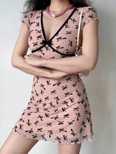 𝔇𝔢𝔱𝔞𝔦𝔩𝔰: Style: Coquette, Ballet Core, Soft Girl Materials: Polyester & Spandex Quantity: Dress This girly and elegant dress features beautiful floral and ribbon prints, perfect for summer days or special occasions. The A-line silhouette is designed to flatter your curves, while the mysterious color adds an element of intrigue. Solid durable material, perfect for spring & summer Enjoy free shipping with a purchase of over 80$ SIZE CHEST LENGTHS 33 in 31 in M 34 in 31 in L 35 in 32 in XL 36 in 33 inItem measured by hands may have 1-2 in differences.SIZE CHEST LENGTHS 80 cm 81 cm M 84 cm 82 cm L 88 cm 83 cm XL 92 cm 84 cmItem measured by hands may have 2-3 cm differences. V-neck Spring Dresses With Bow Detail, Cute Fitted Mini Dress With Bow, Coquette Short Sleeve Spring Dresses, Coquette Short Sleeve Dresses For Spring, Short Sleeve Coquette Dresses For Spring, Cute Mini Dress With Bow Straps, Spring Party Mini Dress With Bow Print, Fitted Mini Dress With Bow Straps For Summer, Coquette Summer Floral Print Dresses