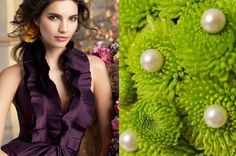 a woman standing next to a green plant with pearls on it