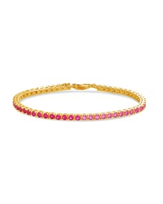 Add a touch of luxury to your look with the Hues of Pink Tennis Bracelet! Featuring a beautiful pink gradient of stones, this stunning tennis bracelet will have you sparkling with grace and elegance. Let your look shine in style! 😊 Materials: 14K gold plated brass, cubic zirconia Features:Measures 7" length, 0.1" width, 2mm CZ stones, Lead & Nickel free, lobster clasp Elegant Pink Crystal Bracelet For Formal Events, Pink Tennis Bracelet, Elegant Pink Crystal Bracelet With Sparkling Stones, Pink Bracelets With Sparkling Stones, Pink Cubic Zirconia Bangle Bracelets, Classic Pink Tennis Bracelet With Jubilee Design, Classic Pink Tennis Bracelet With Jubilee Style, Pink Jubilee Tennis Bracelet In Classic Style, Classic Pink Tennis Bracelet