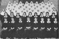 an old black and white photo of women dressed in nun costumes