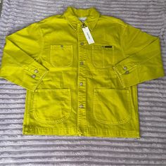 Unisex Yellow Calvin Klein Jacket, Long Sleeve, Pockets In The Front, Size S But It Fits Like Size M For Women, The Length Of The Jacket Is Up To The Hips. Really Nice Look, New With Tag, Buttons Down. Calvin Klein Button-up Spring Outerwear, Calvin Klein Spring Outerwear With Button Closure, Calvin Klein Single Breasted Spring Outerwear, Calvin Klein Single Breasted Outerwear For Spring, Classic Green Utility Jacket For Spring, Calvin Klein Single-breasted Outerwear For Spring, Calvin Klein Single-breasted Spring Outerwear, Calvin Klein Spring Button-up Outerwear, Casual Calvin Klein Blazer For Spring