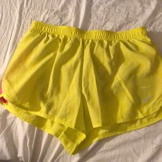 Nwt Yellow Nike Shorts. Never Been Worn. Nike Spring Activewear Shorts, Nike Spring Activewear, Nike Running Bottoms, Casual Nike Bottoms For Running, Casual Nike Running Bottoms, Nike Shorts For Jogging, Yellow Athletic Shorts With Built-in Shorts For Spring, Spring Jogging Fitted Bottoms, Yellow Stretch Short Leg Bottoms