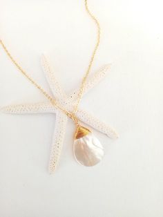 These beautiful necklaces are made from real Mother of Pearl shell on sterling silver or gold plated chain.  Beautiful as a Bride's Jewelry or as a Bridesmaid's Gift. The perfect choice for a unique dainty gift to your mother, daughter, best friend or just because you deserve it. Each item is carefully packaged in an elegant jewelry box.  If you would like to add a personalized note with your order, just write a note at checkout and I will send a small card with your gift to the recipient. If yo Pearl Drop Shell Necklace Gift, Pearl Drop Shell Necklace As A Gift, Shell Shaped Pearl Drop Necklace Gift, White Shell Dainty Jewelry, Pearl White Shell Pearl Necklace As Gift, Gift Pearl White Necklace, Elegant Shell Charm Necklace For Gift, Elegant Shell Charm Necklaces For Gift, Dainty White Shell Jewelry