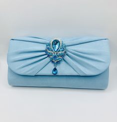 Stunning Baby Blue Powder Blue Dusty Dusky Blue Crystal and Diamanté Embellished Bridal Wedding Clutch Bag with Silver Chain Soft Suede Style Finish Very Elegant Perfect Wedding Day Clutch Bag  Size Approx. 27cm x 14cm x 7cm Co-ordinating shoes also available Blue Rhinestone Evening Bag For Weddings, Blue Evening Bag With Rhinestones, Blue Rhinestone Evening Bag, Blue Rhinestone Evening Bag For Party, Blue Embellished Evening Bag For Formal Occasions, Formal Blue Embellished Bags, Formal Blue Embellished Evening Bag, Embellished Blue Party Clutch, Elegant Blue Evening Bag With Rhinestones