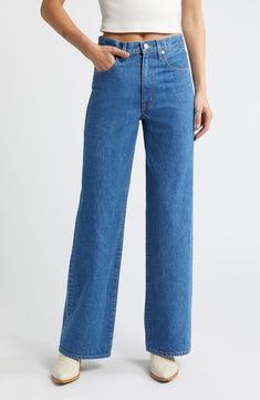 Crafted from Italian stretch denim in Los Angeles, these casual-cool jeans feature a superhigh waist and full-length wide legs for a contemporary look. 32" inseam; 21" leg opening; 12" front rise; 15" back rise (size 29) Zip fly with button closure Five-pocket style 100% cotton Machine wash, tumble dry Made in the USA of imported fabric Modern High-rise Denim Blue Flare Jeans, Modern High Rise Denim Blue Flare Jeans, Modern High-waisted Denim Flare Jeans, Modern High Rise Dark Wash Flare Jeans, Modern High-rise Denim Blue Jeans, Modern High Rise Denim Blue Jeans, Modern Medium Wash Full Length Bottoms, Modern Full-length Bottoms In Medium Wash, Modern Full-length Medium Wash Bottoms