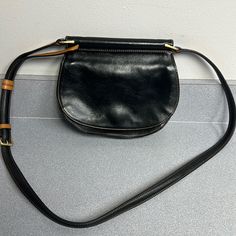 Nwt Cute Black Leather Crossbody With Patterned Interior Fabric. Believe It Is From 2015 Collection. Fall Black Leather Lined Shoulder Bag, Classic Black Satchel For Fall, Fall Black Bags With Leather Lining, Black Leather Lined Bags For Fall, Black Leather-lined Bags For Fall, Black Crossbody Saddle Bag For Office, Black Saddle Bag With Detachable Strap For Work, Leather Lined Saddle Bag For Office, Vintage Black Satchel With Leather Backing