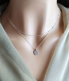 special trendy necklace. Consists of two chains to choose from: 1. Tiny bars necklace . Sterling Silver 925 2.Tiny Silver Disc Necklace 925 silver A perfect companion for our t bar necklace to complete the set! https://www.etsy.com/il-en/listing/912587739/y-shaped-necklace-elegant-necklace?ref=shop_home_active_6&pro=1&frs=1 Shown on the model: 15 inches + 17 inches MATERIALS All 925 Sterling Silver! in order to make your decision easier we offer: ♥ High Quality Designer Jewelry ♥ FREE Gi Everyday Sterling Silver Layered Necklace With Delicate Chain, Silver Minimalist Layered Necklace With Double Chain, Silver Dainty Jewelry With Double Chain, Silver Dainty Double Chain Jewelry, Silver Dainty Double Chain Necklace, Sterling Silver Double Strand Chain Necklace, Dainty Silver Jewelry With Double Chain, Sterling Silver Double Chain Necklace, Dainty Silver Double Chain Necklace