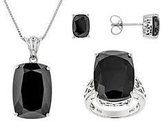 44.39ctw rectangular cushion black spinel rhodium over sterling silver ring, pendant with chain and earrings set. 3.5mm bail. 2" extender. Formal Black Spinel Fine Jewelry, Classic Black Spinel Jewelry With Polished Finish, Black Sterling Silver Jewelry With Rectangular Stone, Black Sterling Silver Rectangular Jewelry, Fine Jewelry In Silver With Black Spinel, Modern Black Spinel Jewelry For Gifts, Silver Faceted Black Spinel Jewelry, Formal Black Jewelry With Rectangular Stone, Faceted Black Spinel Silver Jewelry