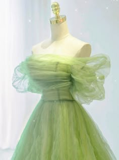 A-line Tulle Evening Dress For Homecoming, Fitted Green Organza Ball Gown, Green Organza Evening Dress For Prom, Green Tulle Evening Gown, Green Tulle Evening Dress, Elegant Green Tulle Ball Gown, Green Fitted Ball Gown For Debutante Ball, Green Organza Ball Gown Evening Dress, Green Organza Evening Dress For Banquet