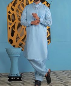 Classic Sky Blue Men's Shalwar Kameez | Elegant and Timeless Elevate your wardrobe with our classic Navy Blue Men's Shalwar Kameez, a perfect blend of tradition and modern style. This versatile outfit is crafted from high-quality, breathable fabric, ensuring comfort and durability. The rich Navy Blue color adds a touch of sophistication, making it ideal for both casual and formal occasions.   Men's Sky Blue Shalwar Kameez Traditional Wear Premium Elegant Shalwar Kameez | Shirt Collar Kameez Shal Blue Naqshi Straight Kurta Traditional Wear, Blue Cotton Sherwani With Dabka Work, Blue Anarkali Kurta For Eid, Eid Anarkali Kurta In Blue, Eid Anarkali Blue Kurta, Traditional Blue Kurta With Naqshi, Semi-formal Traditional Blue Wear, Transitional Blue Kurta With Dabka Work, Semi-formal Blue Traditional Wear