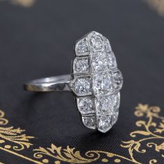 This ring is full of Edwardian charm, with its romantic lines! The diamonds all have great makes to them and oh-so sparkly on the finger too. A great ring to add to one's daily jewelry suite as the ring has just enough bling for both day and night wear yet not nearly as big and bold as most dinner rings. Platinum, size 7, and fully sizable.Diamonds are G/H/I colors, SI clarities.Please see qualitative report for more information. Dazzling Rose Cut Diamond Anniversary Rings, Dazzling Rose Cut Diamond Rings For Anniversary, Luxury Rose Cut Diamond Crystal Ring, Luxury Crystal Ring With Rose Cut Diamonds, Exquisite Marquise Brilliant Cut Diamond Ring, Rose Cut Diamond Ring For Anniversary, Anniversary Crystal Ring With Rose Cut Diamonds, Exquisite Marquise Cut Diamond Ring For Anniversary, Exquisite Marquise Ring With Single Cut Diamonds