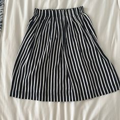 Navy Blue And White Stripped Midi Skirt Nwt Size 00 Chic Striped Lined Skirt Bottoms, Chic Relaxed Skirt With Striped Hem, Chic Skirt With Striped Hem And Relaxed Fit, Striped Summer Skirt, Chic Spring Skirt With Striped Hem, Chic Striped Knee-length Bottoms, Chic Vertical Stripes Midi Skirt, Chic Striped Hem Skirt For Summer, Chic Summer Skirt With Striped Hem