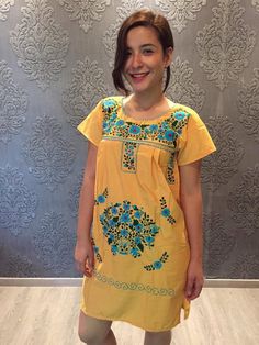 "Beautiful mini embroidered dress, ideal for spring and summer, mexican parties, etc. Bright and colourful Loose fit Made of cotton Fits size Small Measurements taken flat: - Shoulder to shoulder 16\" - Arm hole 8 1/4\" - Armpit to armpit 17 3/4\" - Width 22 1/2\" - Shoulder to bottom length 36 3/4\"" Cotton Sundress With Short Sleeves For The Beach, Festival Floral Print Short Sleeve Dresses, Cotton Mini Dress With Short Sleeves For Vacation, Short Sleeve Dress With Multicolor Embroidery For Summer, Multicolor Embroidery Short Sleeve Summer Dress, Cotton Short Sleeve Sundress, Summer Dresses With Floral Embroidery And Short Sleeves, Embroidered Short Sleeve Mini Dress For Vacation, Cotton Short Sleeve Mini Dress For Beach