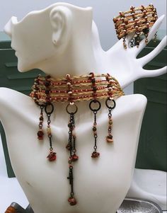 This is an exquisite design, red jasper raw nuggets, patina, raw copper beads, handcrafted with genuine horsehair. Lots of style, and beauty. You can create your own design using your own horse's hair! Keepsake Jewelry. The design shown in pictures is the exact piece you will receive. 15 inch Choker Equestrian Jewelry55 Send me a message if you would like your own keepsake! Join us on Pier 60, Clearwater Beach Nightly Festival. Like our page on Facebook for coupon codes on your purchase. Listing is for the choker only. All designs are copyright protected. Bohemian Brown Copper Wire Jewelry, Rustic Copper Jewelry For Festivals, Rustic Hand Forged Brown Jewelry, Rustic Brown Hand Forged Jewelry, Brown Multi-strand Jewelry For Festival, Earthy Hand Forged Brown Jewelry, Rustic Bronze Beaded Jewelry, Rustic Hand Wrapped Jewelry For Festivals, Handmade Adjustable Rust Jewelry