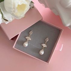 * DETAILS * - Natural Freshwater Baroque Pearls - 18K gold plated on brass Fan Shape Charms size 14mm - Cubic Zirconia Paved Post Earrings 15*8mm (Sterling silver pin) 👉🏻For more earrings, see https://www.etsy.com/shop/JinnysJewelryBySeJin ✨Baroque pearls are pearls with an irregular non-spherical shape. Shapes can range from minor aberrations to distinctly ovoid, curved, pinch, or lumpy shapes. Most cultured freshwater pearls are baroque. 👉🏻Please note that all Jinny's Jewelry pieces are cr Elegant Drop Clip-on Earrings As Gift, Plated Drop Clip-on Earrings As Gift, Gold Teardrop Clip-on Earrings For Wedding, Elegant Gold Plated Chandelier Earrings As A Gift, Elegant Gold Plated Chandelier Earrings For Gift, Gold Plated Single Earring For Wedding, Gold Plated Bridal Dangle Earrings For Celebration, Delicate Gold Earrings For Anniversary, Elegant Yellow Gold Teardrop Earrings For Wedding