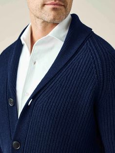 This shawl collar cardigan is knitted in Bergamo, Northern Italy, with 100% four-ply cashmere from the prestigious Cariaggi Fine Yarns Collection, using gauge five with a weight of circa 800 gr.This cardigan is crafted with a ribbed handle that locks in warmth and feels superbly soft but robust. It fastens with classic horn buttons and has elegant double-fronted pockets. Our distinguished shawl collar sits neatly over both button-downs and crew-neck tees to create a timeless look. Designed for a