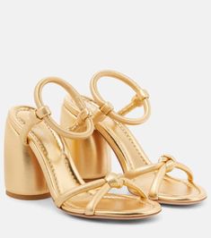 Designer Gold Open Toe Sandals, Luxury Gold Sandals With Round Toe, Gold Leather Evening Sandals, Modern Gold Sandals With Open Heel, Gold Sandals With Open Heel, Modern Style, Gold Open Toe Leather Heels, Luxury Gold Closed Toe Sandals, Luxury Metallic Open Toe Sandals, Gold Leather Open Toe Heels