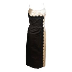 This Oleg Cassini cocktail dress is composed of black and off-white silk with lace applique. There is a center back zipper closure. and spaghetti strap. In excellent vintage condition. **Please cross-reference measurements for personal accuracy. Measurements (Approximately) Length: 39.25" Bust: 33" Waist: 25" Hip: 36.5" Vintage Silk Dress With Spaghetti Straps, Black And White Cocktail Dress, Black And White Cocktail Dresses, Lacy White Dress, 1980s Clothing, Black And White Cocktail, 80s Life, Classic Couture, Black And White Contrast