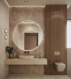 a bathroom with a round mirror above the sink