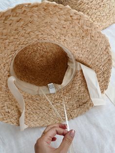 Get ready, the Ella Summer Girl Hat has arrived. Featuring with cotton neck tie and adjustable string inside the hat, this is the ultimate seaside accessory for your mini. Size: One Size 53cm Suitable for children aged 3+ years. Color: Off White Imported Summer Beach Sun Hat With Ribbon, Summer Straw Hat With Ribbon For Beach, Adjustable Brimmed Bucket Hat For Beach Season, Beach Boater Hat With Ribbon And Short Brim, Straw Beach Hat With Ribbon, Straw Hat With Ribbon And Curved Brim For Beach, Beach Straw Hat With Ribbon And Curved Brim, Wide Brim Beach Hat With Ribbon, Curved Brim Straw Hat With Ribbon For Beach