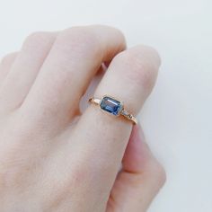 The Maggey ring is like an old soul, a classic beauty with hints of the modern woman.  This up-to-date vintage inspired ring can be worn as an alternative engagement ring, or as an everyday ring. Details: 14k gold (available in rose, white or yellow gold)Emerald cut Blue Sapphire is 5.5mm x 4mm Tapered diamond baguette White Gold Sapphire Ring, Vintage Inspired Rings, An Old Soul, Diamond Baguette, Alternative Engagement Ring, Everyday Ring, Blue Sapphire Ring, Everyday Rings, The Mill