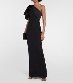 Maelys crêpe gown in black - Safiyaa | Mytheresa Elegant Gown With Draped Sleeves And Asymmetrical Neckline, Elegant Evening Gown With Draped Sleeves, One-shoulder Formal Dress With Bow, Formal Gown With Draped Sleeves And Asymmetrical Neckline, Gala Evening Dress With Detachable Bow And Fitted Bodice, Pre-draped Gown With Draped Sleeves For Gala, Elegant Gala Gown With Draped Sleeves, Silk Gown With Draped Sleeves For Gala, Pre-draped Gown With Asymmetrical Neckline For Formal Occasions