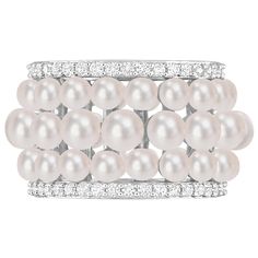 This exquisite piece showcases a sterling silver band adorned with an array of beautiful white button-shaped freshwater cultured pearls and sparkling lab-created white sapphires. Immerse yourself in the timeless elegance and sophistication this ring brings, making it a truly enchanting accessory for any occasion. | Pearl and Lab-Created White Sapphire Ring | Sterling Silver | Size 7 | Helzberg Diamonds White Pearl Jewelry With Diamond Accents, Luxury Pearl-embellished Jewelry For Anniversary, Luxury Pearl Embellished Jewelry For Anniversary, Elegant White Stackable Jewelry, Formal Stackable Pearl Ring, Fine Jewelry, Formal Stackable Pearl Ring Fine Jewelry, Stackable Pearl Ring For Formal Events, Stackable Pearl Ring For Formal Occasions, Elegant Sterling Silver Stackable Pearl Ring