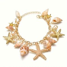 Conch Shell Starfish Beach Bracelet Ocean Vacation Sea Pearls Boho Summer Brand New In Original Package No Price Tags Attached Gold Tone Metal Chain Real Shells Faux Pearls ***I Have Matching Necklace & Other Shell Jewelry Listed In My Closet*** Party Work Office School Gift ***Check Out My Other Items** Save $$ On Shipping!!! (6c113171) Tags Home, Country ,Collectable, Vintage, Figurine ,Office, Boho, Hippie, Stylish, Gift, Fashion, Surfer, Vacation, Beach, Unisex, Vegan, Minimalist, Western, S Beach Jewelry With Charms, Beach Charms Jewelry, Shell Bracelet For Beach Season, Starfish Charm Bracelets For Beach Season, Beach Charms Bracelet Jewelry, Summer Beach Jewelry With Charms, Vacation Bracelet With Starfish Charm, Starfish Charm Strand Jewelry For Vacation, Starfish Charm Jewelry For Vacation