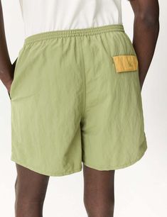 Patagonia baggies shorts (5in) in buckhorn green: these versatile shorts are perfect for land or sea with a mesh liner and quick-drying netplus® material made from recycled fishing nets helping to reduce ocean pollution.    the 5" inseam and fair trade certified™ factory make them both functional and ethical. get ready to take on the great outdoors in style!    product details —    — material: netplus® 100% postconsumer recycled nylon  — durable water repellent (dwr) finish  — recycled polyester Patagonia Sale, Patagonia Shop, Patagonia Baggies, Ocean Pollution, Patagonia Shorts, Caged Sandals, Fishing Nets, Black Aviators, Neon Purple