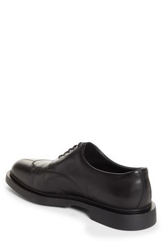 Walk the fine line between classic style and comfort in this French-crafted derby made from supersoft calfskin leather and set on a rubber sole. Lace-up style Leather upper and lining/rubber sole Made in France Men's Designer Shoes Black Calf Leather Oxfords For Derby, Black Calf Leather Derby With Plain Toe, Black Calf Leather Derby For Work, Black Calf Leather Derby Shoes With Plain Toe, Black Calf Leather Derby Shoes For Work, Leather Moc Toe Derby For Work, Black Plain Toe Derby In Calf Leather, Black Plain Toe Calf Leather Derby Shoes, Black Goodyear Welted Derby Shoes In Calf Leather