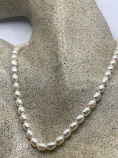 Vintage white Pearl 16 in Necklace  Freshwater Pearl necklace. We can add an extension to legthen  All jewelry is shipped in a nice gift box.   Check out our over a THOUSAND great reviews Classic Pearl Necklace Gift, Classic Pearl Necklace As A Gift, Classic Pearl Necklace With Round Beads, Classic Pearl Necklace With Round Beads As Gift, Classic Single Strand Pearl Necklace Gift, Classic Single Strand Pearl Necklace As Gift, Classic White Pearl Charm Jewelry, Classic 16 Inch Necklace For Gift, Classic Single Strand Necklace Gift