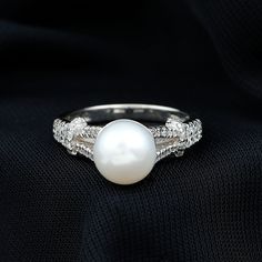 Product Details Artistically crafted in Gold, this Split Shank Ring features Round Freshwater Pearl and Diamond beautifully. This Freshwater Pearl Engagement Ring would be a perfect fit if your partner is a june born. Get this beautiful Freshwater Pearl and Diamond Engagement Ring for you lady and make her feel elated. Product Information SKU SHP-RINGS032210366 Width 8 mm Height 10.5 mm Weight 2.72 gm (Approximate) FRESHWATER PEARL INFORMATION No.of Stones 1 Pieces Total Weight 7.48 Carat (Appro Pearl And Diamond Engagement Ring, Pearl Engagement Ring, Split Shank Ring, Ring With Diamond, 18k Yellow Gold Ring, Split Shank, Solitaire Engagement, Solitaire Engagement Ring, Yellow Gold Rings