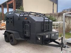 an armored vehicle parked in front of a building