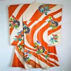 Authentic Japanese vintage kimono - Furisode, long sleeve kimono. Embroidered with gold threads for some flowers. Condition: There are some noticeable stains and spots as you can see in the photos. This kimono is a preowned vintage item so cannot be expected to be in perfect condition. This gorgeous vintage kimono can be upcycled into a dress or various crafting ideas even if you don't want to wear it as a kimono. Approx.Size Length: 154cm Sleeve length: 127cm Back width: 60cm Sleeve length: 96cm Fully lined. Dry cleaning only. NOTE: The items are sold as is and we will not accept any return or exchange because of the aging signs and flaws. Please read the item descriptions and see the photos carefully before placing an order. The color may be slightly different from the actual product. *S Okinawa Island, Long Sleeve Kimono, Japanese Vintage, Vintage Kimono, Womens Robes, Gold Threads, Japan Post, Clothes Patterns, Crafting Ideas