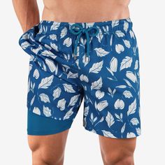 Model's height: 183cm/6'0", Model is wearing: Medium Collins is our premier and most iconic swim short. The Built-in liner is super soft, supportive and 100% chafe-free. No more mesh, just comfort. Available in Shirt- Autumn Blue Blue Swimwear With Built-in Shorts For Sports, Blue Athleisure Swimwear With Built-in Shorts, Blue Athletic Shorts With Built-in Shorts For Summer, Summer Fitted Breathable Athletic Shorts, Fitted Breathable Athletic Shorts For Summer, Functional Swimwear With Built-in Shorts For Swimming, Blue Stretch Breathable Swim Trunks, Compressive Functional Athletic Shorts For Summer, Functional Compressive Athletic Shorts For Summer