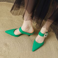 Elegant and stylish mules that offer you an effortless chic look. Upper: Genuine Leather Lining: Genuine Leather Outsole: Rubber Toe Shape: Pointy Toe Heel: 6.5cm/2.5'' Closure: Slip on Fashion Element: Square Rhinestone Decoration is_handmade: Yes Summer Office Heels With Buckle Closure, Trendy High Heel Mules With Buckle Closure, Trendy Green Heels With Buckle Closure, Elegant Green Mules For Evening, Elegant Green Open Toe Mules, Chic Green Mules For Formal Occasions, Synthetic Closed-toe Kitten Heels For Spring, Spring Office Closed Toe Sandals, Green Evening Mules For Summer