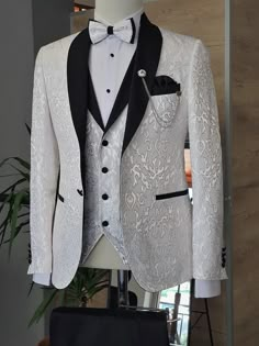 Suit Material: 65% viscose, 35% polyester Machine Washable: No Fitting: Slim-Fit Cutting: Double Slits, One Button Package Include: Suit Clothes: Jacket, Vest and Pants Gifts: Shirt, Bow Tie and Chain Shawl Lapel Tuxedo, Tuxedo Colors, Costum Elegant, Pants Gift, Groom Tuxedo, Wedding Suits Groom, White Tuxedo, Dress Suits For Men, Suit Ideas