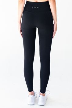 The Nautilus Seamless Legging in Black is designed to enhance your active lifestyle. The high-waist compression waistband provides a secure fit and the subtle contouring accentuates your curves. The full-length design is versatile for any workout or activity. Made with seamless technology, these leggings stretch to hug your body for a comfortable fit and unrestricted movement. The fabric is soft to the touch and quick to dry, making it perfect for everyday wear. Experience the ultimate in comfort and performance with the Nautilus Seamless Legging. Material: 87% Nylon & 13% Spandex GSM: 280G Model is 5'9" and wears a size S Functional Elastane Tights With Wide Waistband, Compressive Seamless Elastane Leggings, Compressive Seamless Leggings Made Of Elastane, Functional Micro-elastic Tights With Contoured Waistband, High Waist Stretch Activewear With Smoothing Details, High Waist Smoothing Stretch Activewear, Compressive Elastane Leggings With Seamless Construction, Compressive Functional Tights With Wide Waistband, Sleek Compression Solid Bottoms