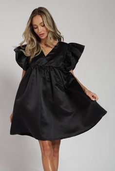 Okay so your holiday outfit just got cuter! Stepping that LBD game up with some ruffles and a little flare! Fits tts Cute V-neck Dress With Ruffle Hem, Chic Mini Length Dress-up Dresses, Flirty Ruffle Sleeve Mini Dress For Party, Cute Brunch Dress With Ruffle Hem, Cute Dresses With Ruffle Sleeves, Black V-neck Dress For Holiday, Black V-neck Holiday Dress, Cute Ruffled Dress For Brunch, Cute Ruffle Sleeve Dress For Brunch