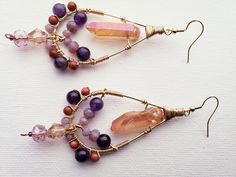 Unique Dangle Earrings With Gemstone Beads, Handmade Spiritual Beaded Dangle Earrings, Bohemian Amethyst Chandelier Earrings Gift, Bohemian Teardrop Wire Wrapped Earrings, Artisan Teardrop Chandelier Earrings As Gift, Handmade Amethyst Long Drop Jewelry, Handmade Spiritual Crystal Earrings, Wire Wrapped Teardrop Beaded Earrings Gift, Bohemian Gemstone Teardrop Earrings