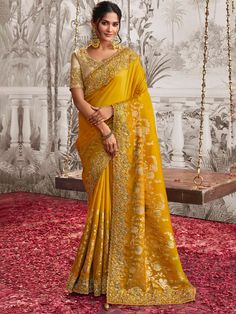 Halley Satin Embroidered Work Designer Border Saree Premium quality fabric Enhanced with thread & tiki embroidery work. Comes with unstitch blouse fabric High quality fabric and stitching. Introducing the Halley Saree, crafted from luxurious satin silk and adorned with intricate embroidered Tiki work and a designer border. Elevate your style with this elegant saree and turn heads at any occasion. Yellow Embroidery Saree, Saree Couture, Haldi Saree, Engagement Sarees, Engagement Saree, Haldi Outfits, Character Wardrobe, Border Saree, Female Dress