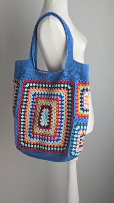 Colorful Crochet Granny Square Shoulder Bag in Vintage Style,  also perfect for the  Summer and as a Market bag. ⛱️🌴🛍️ This beautiful blue tone Colorful Crochet Granny Square Shoulder Tote Bag is perfect for carrying all your essentials.  It is made with a combination of colorful granny squares and a sturdy shoulder strap. The bag is lined with a soft cotton fabric . The bag is perfect foreveryday use and is sure to make a statement wherever you go. It is a great way to show off your unique st Blue Crochet Tote Bag For Shopping, Blue Crochet Shopping Bag With Double Handle, Blue Rectangular Crochet Bag For Beach, Blue Crochet Beach Bag, Trendy Blue Crochet Bag For Everyday Use, Trendy Blue Crochet Bag For Everyday, Colorful Crochet Shoulder Bag For Everyday Use, Blue Crochet Bag With Large Capacity For Daily Use, Blue Crochet Bag With Double Handle For Everyday Use